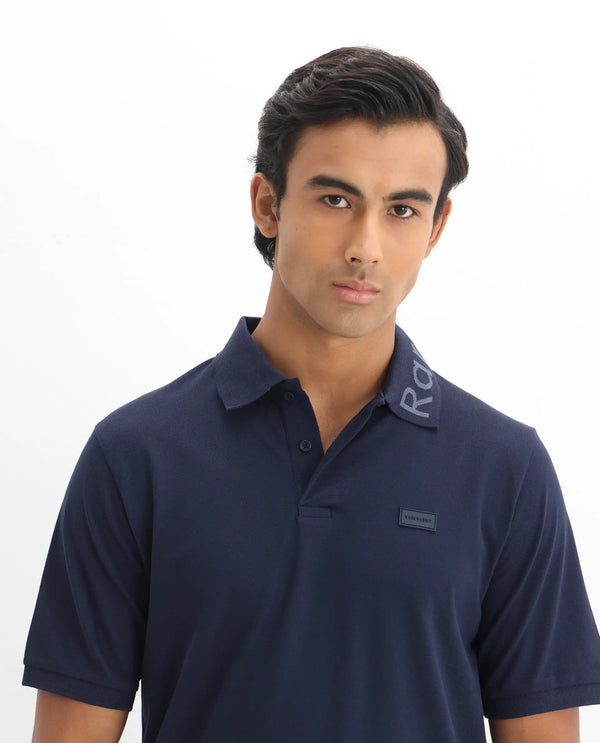 Rare Rabbit Men Vinc Navy Cotton Fabric Short Sleeve Silicon Badge Button Closure Plain Polo