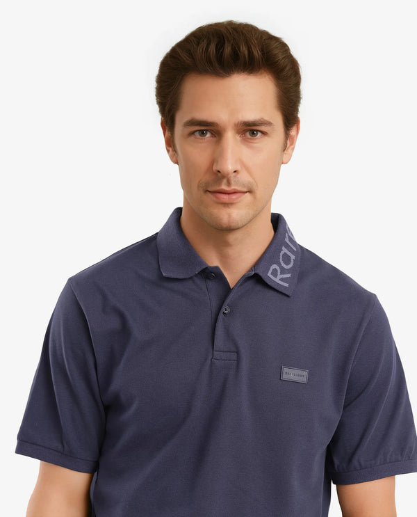 Rare Rabbit Men Vinc Navy Cotton Fabric Short Sleeve Silicon Badge Button Closure Plain Polo