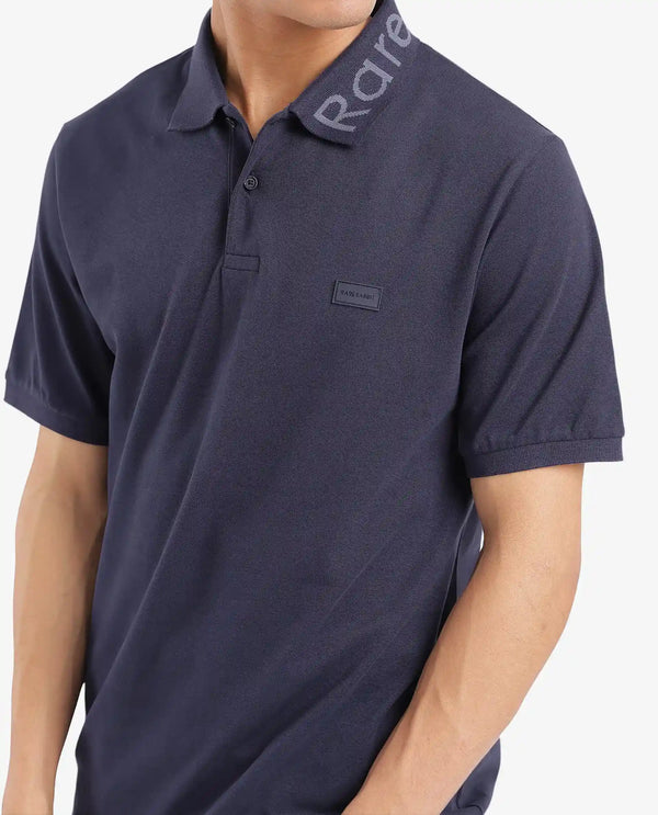Rare Rabbit Men Vinc Navy Cotton Fabric Short Sleeve Silicon Badge Button Closure Plain Polo