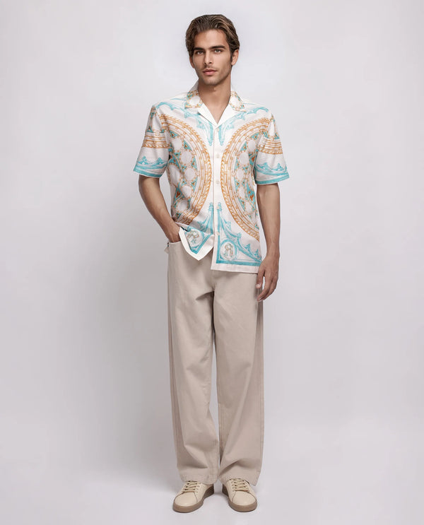 Rare Rabbit Men Yokor Beige Viscose Fabric Half Sleeve Cuban Collar Button Closure Boxy Fit Placement Print Shirt