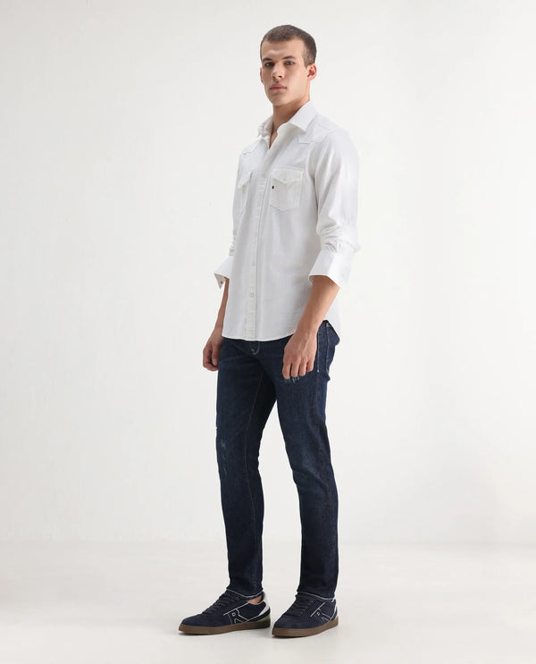 Rare Rabbit Men Yuri Dark Blue Cotton Spandex Fabric Slim Fit Mid Wash Distressed Solid Denim Pant
