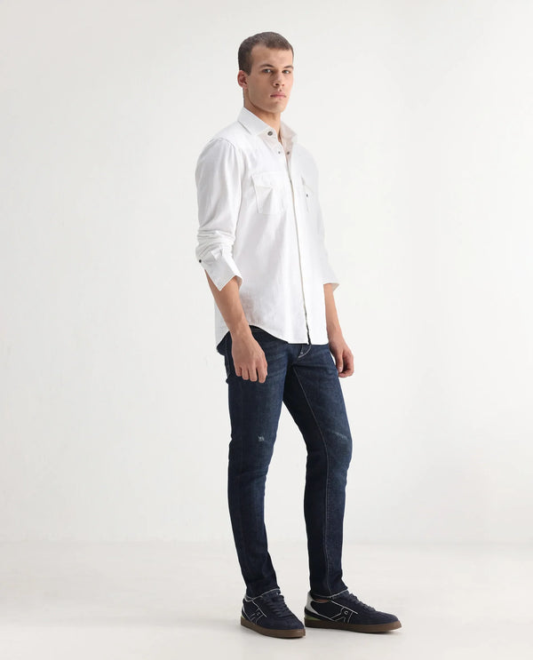 Rare Rabbit Men Yuri Dark Blue Cotton Spandex Fabric Slim Fit Mid Wash Distressed Solid Denim Pant