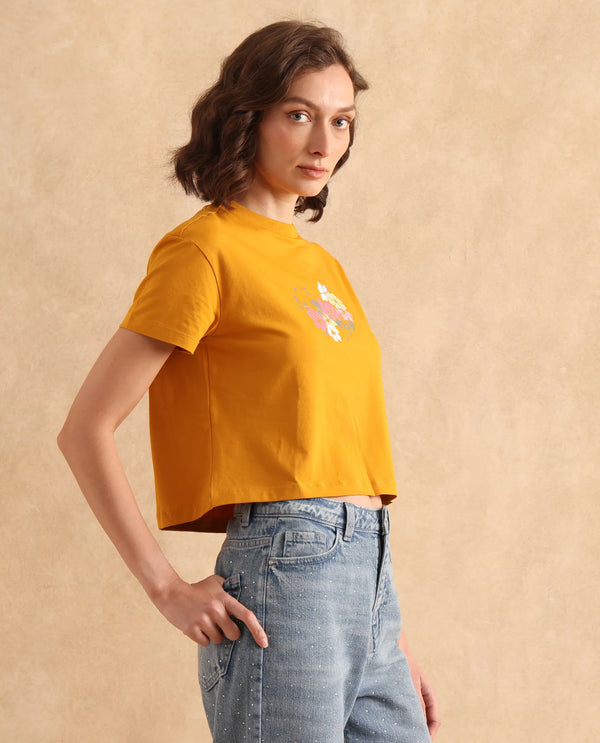 Rareism Women Zenith Dark Mustard Cotton Blend Fabric Short Sleeve Crew Neck Relaxed Fit Cropped Graphic Print T-Shirt