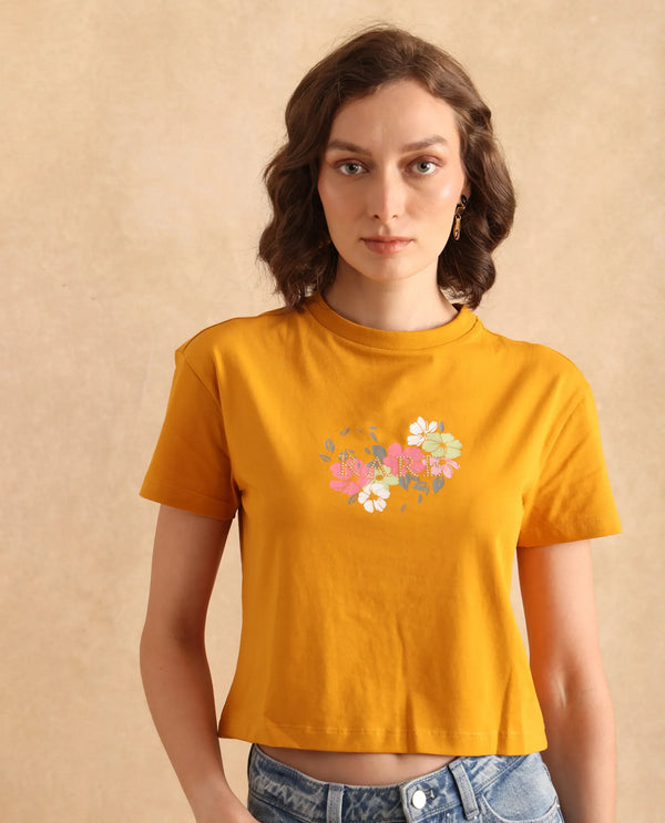 Rareism Women Zenith Dark Mustard Cotton Blend Fabric Short Sleeve Crew Neck Relaxed Fit Cropped Graphic Print T-Shirt