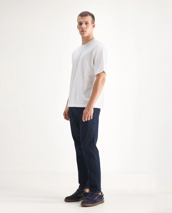 Rare Rabbit Men Gleb Dark Blue Cotton Fabric Mid Rise Carrot Fit Mid Wash Plain Denim Trousers