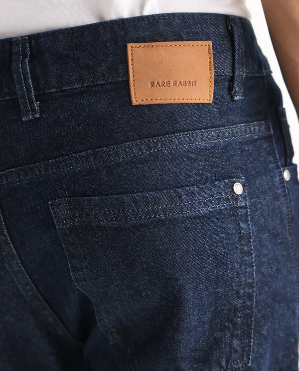 Rare Rabbit Men Gleb Dark Blue Cotton Fabric Mid Rise Carrot Fit Mid Wash Plain Denim Trousers