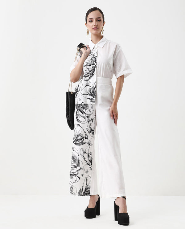 Rareism Women Neilsono White Cotton Satin Fabric Tie-Up Closure Flared Fit Ankle Length Floral Print Trouser