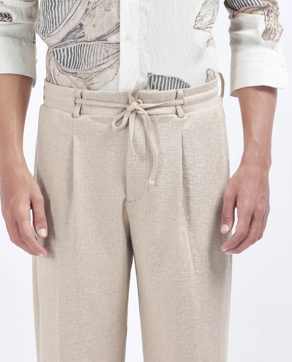 Rare Rabbit Men's Keloe Beige Cotton Polyester Fabric Drawstring Closure Baggy Fit Plain Trouser
