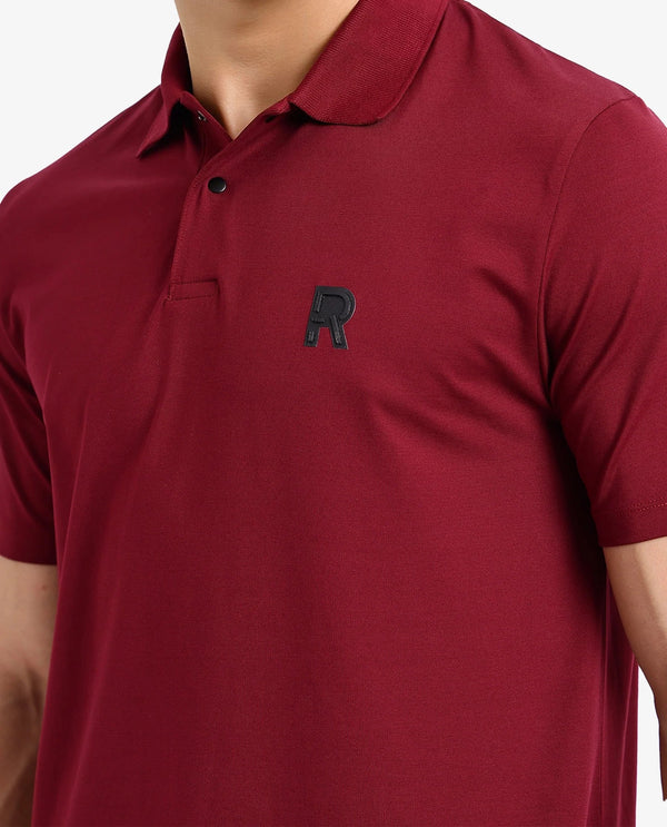 Rare Rabbit Men Merko Maroon Cotton Blend Fabric Short Sleeve Collared Neck Snap Button Closure Leather Badge Detail Plain Polo T-Shirt