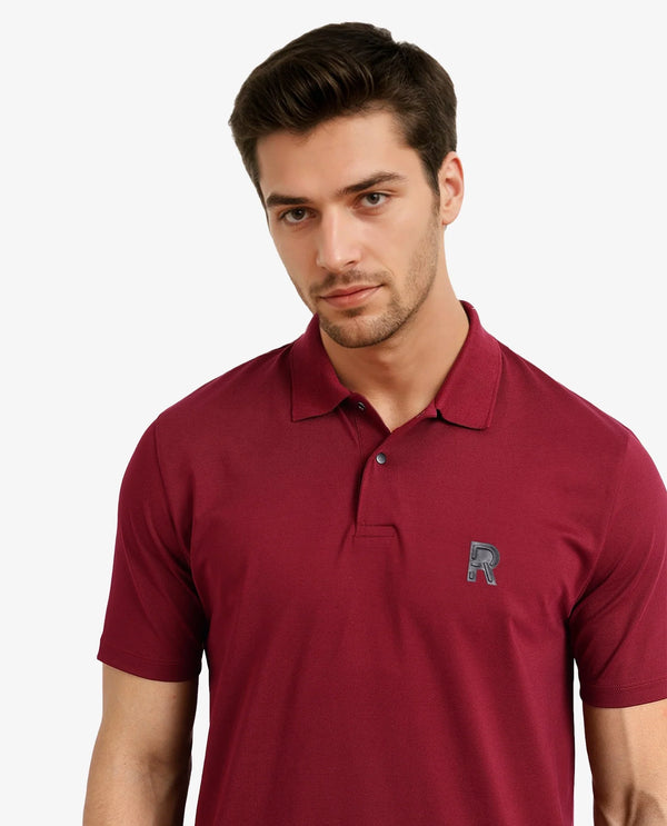 Rare Rabbit Men Merko Maroon Cotton Blend Fabric Short Sleeve Collared Neck Snap Button Closure Leather Badge Detail Plain Polo T-Shirt
