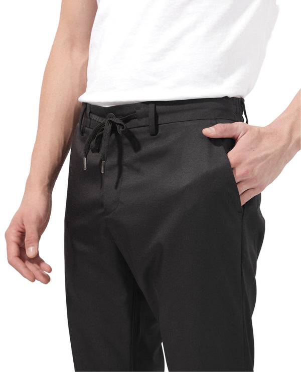Rare Rabbit Men's Nimb Black Polyester Fabric Drawstring And Button Closure High Rise Regular Fit Solid Trousers