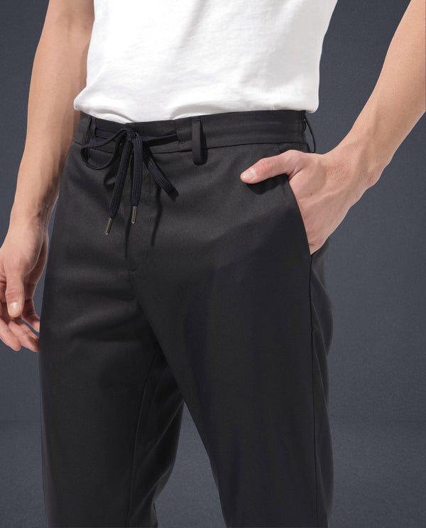 Rare Rabbit Men's Nimb Navy Polyester Fabric Drawstring And Button Closure High Rise Regular Fit Solid Trousers