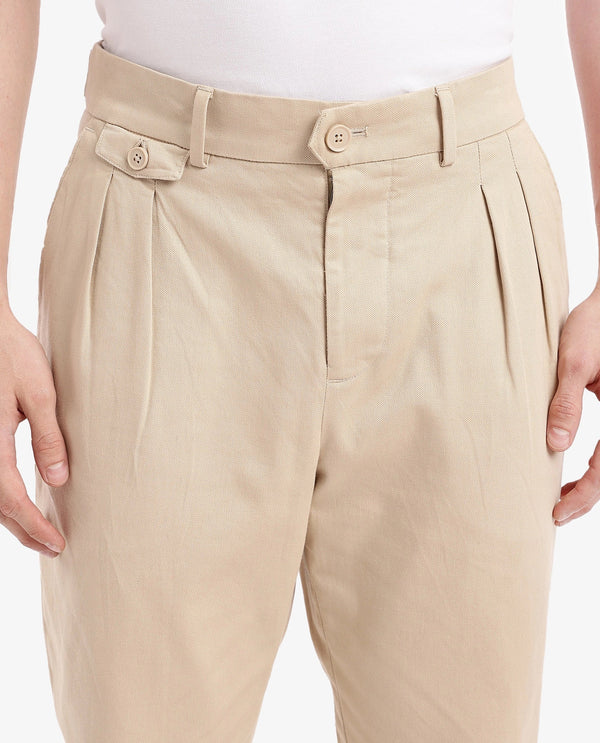 Rare Rabbit Men's Torro Beige Cotton Fabric Solid Regular Fit Relaxed Pleated Trouser